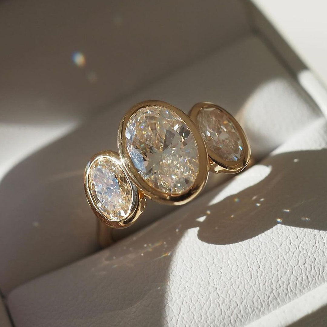 8ct Bezel Setting Three-Stone Oval Cut White Sapphire Ring