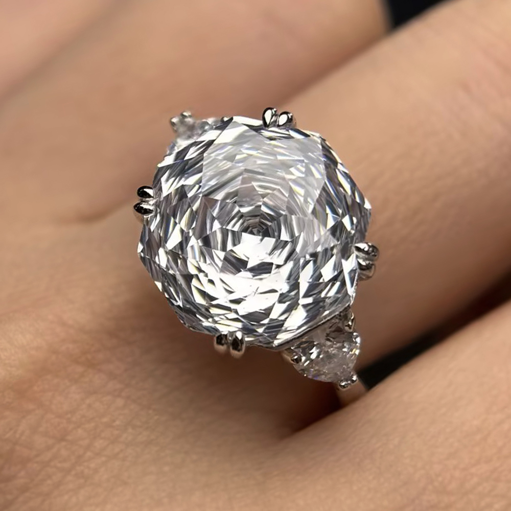 5ct Octagonal Cut White Sapphire Three-Stone Engagement Ring