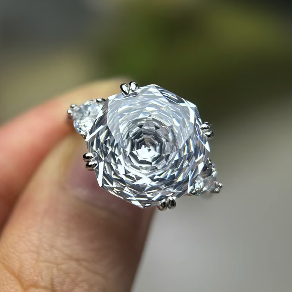 5ct Octagonal Cut White Sapphire Three-Stone Engagement Ring