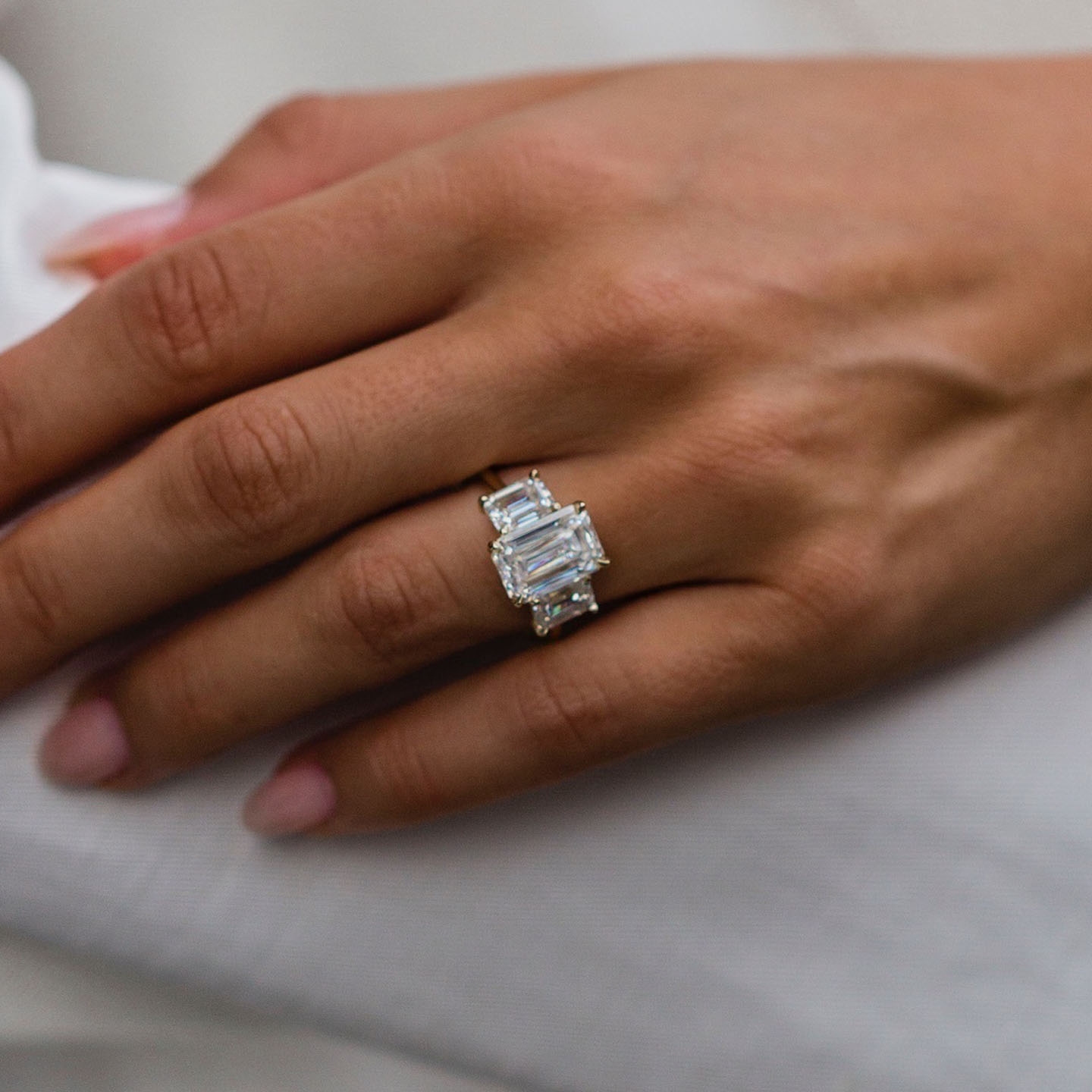 4.5ct Step Emerald Cut Three-Stone Engagement Ring