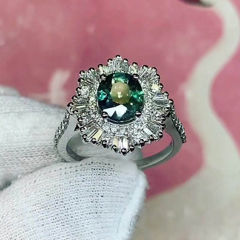 1.5ct Oval Cut Emerald Sapphire Stellar Halo Engagement Ring