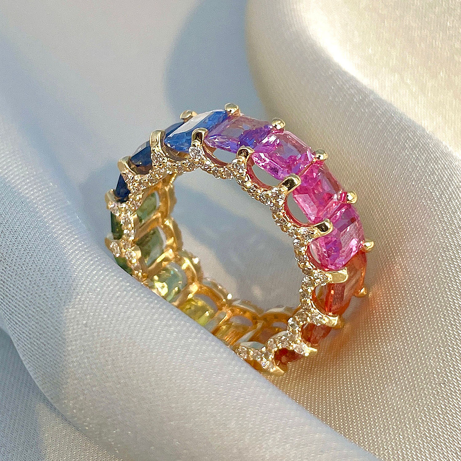6.75ct Emerald Cut Rainbow Sapphire Eternity Ring