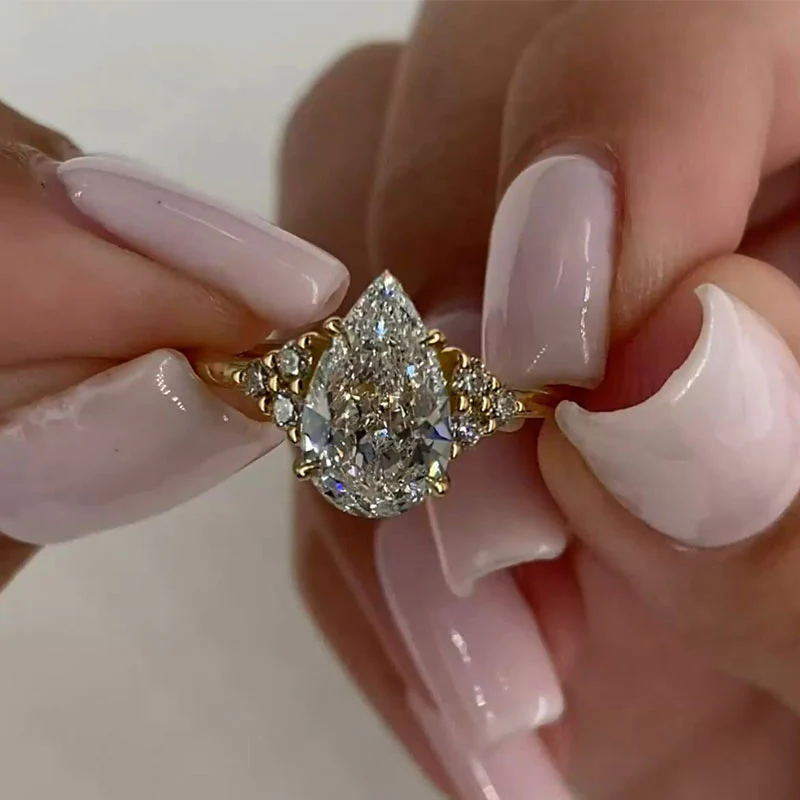 4ct Pear Cut White Sapphire Engagement Ring