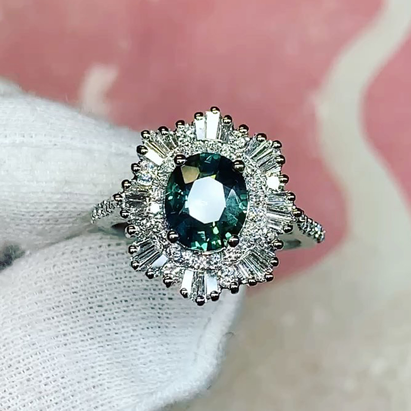 1.5ct Oval Cut Emerald Sapphire Stellar Halo Engagement Ring
