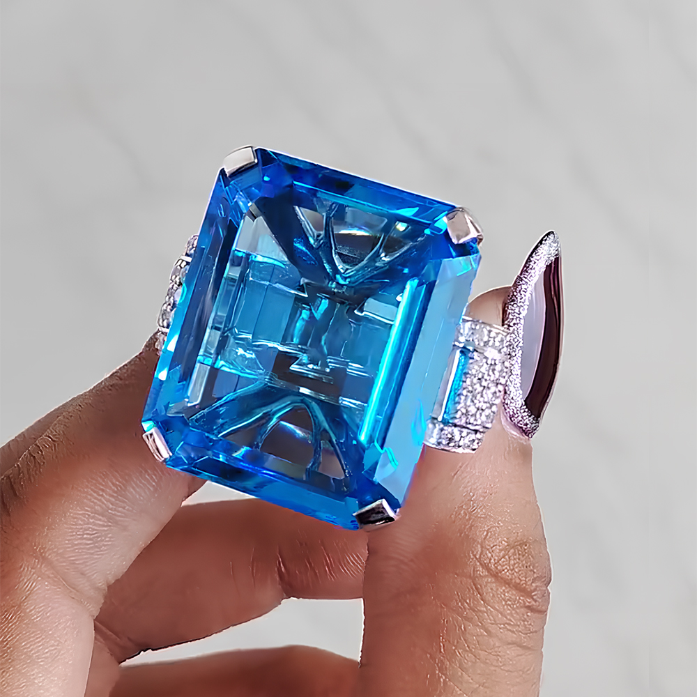 15ct Emerald Cut Blue Sapphire Side Diamond Engagement Ring