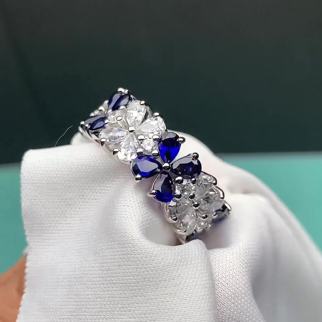 6.55ct Flower Design Pear Cut Blue Sapphire Eternity Ring