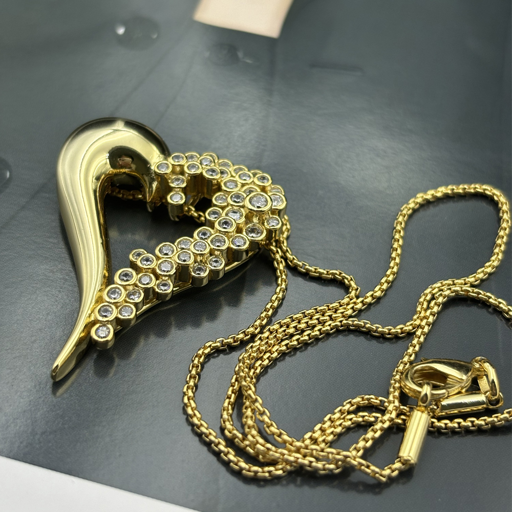 Round Cut Diamond Surrounded Heart Pendant Necklace