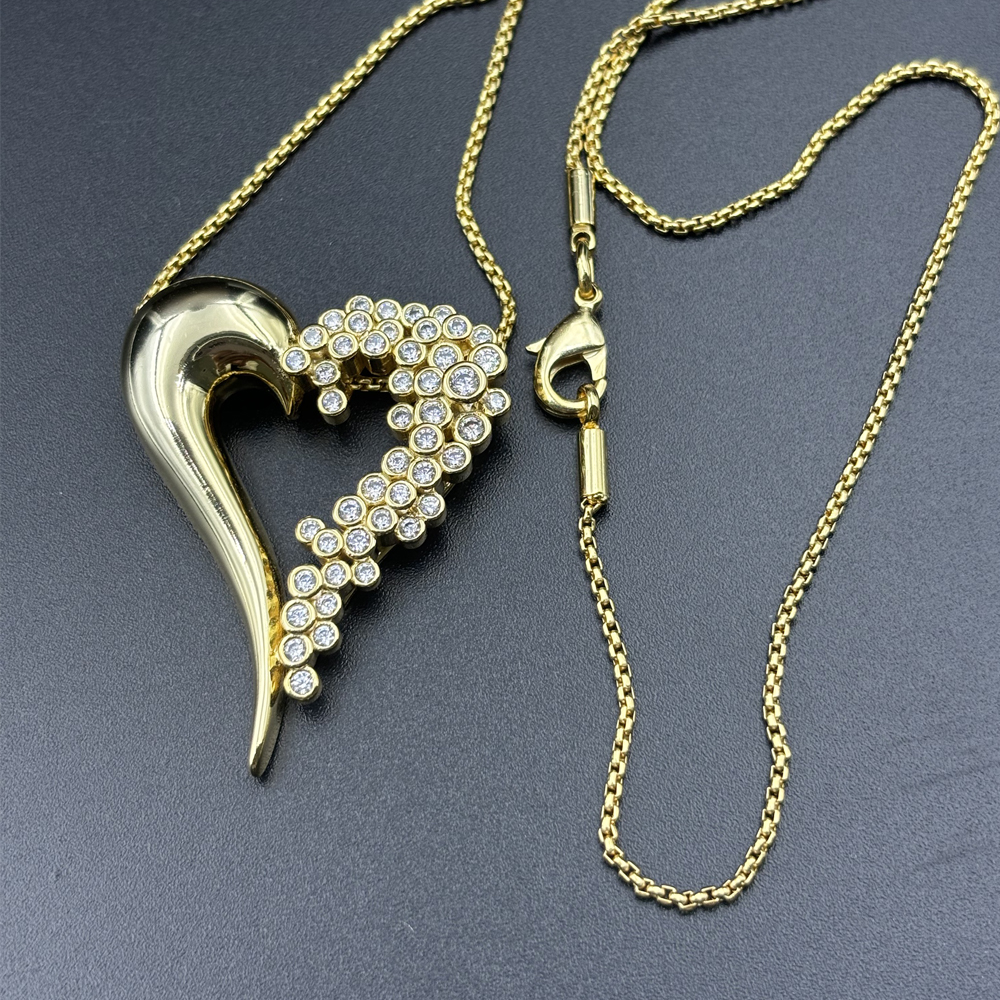 Round Cut Diamond Surrounded Heart Pendant Necklace