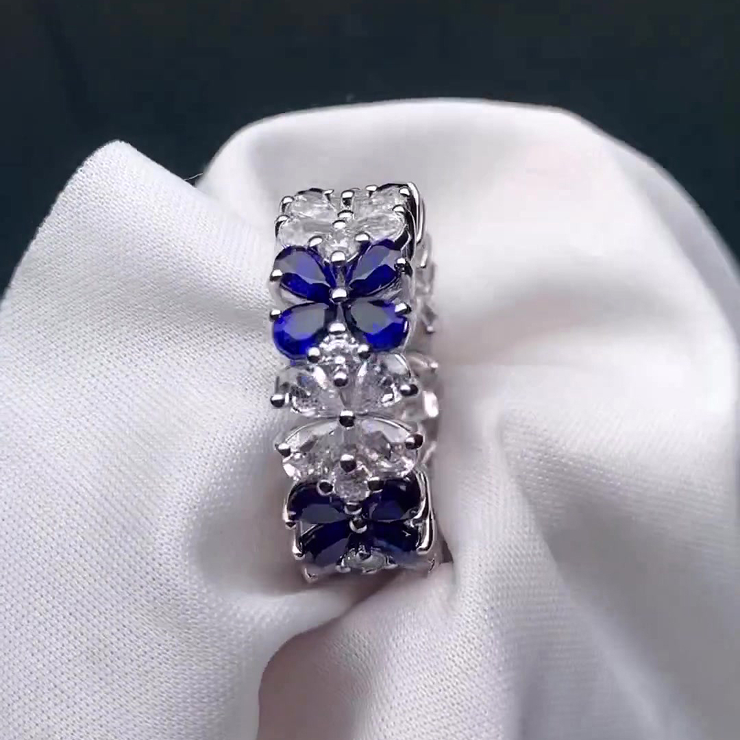 6.55ct Flower Design Pear Cut Blue Sapphire Eternity Ring
