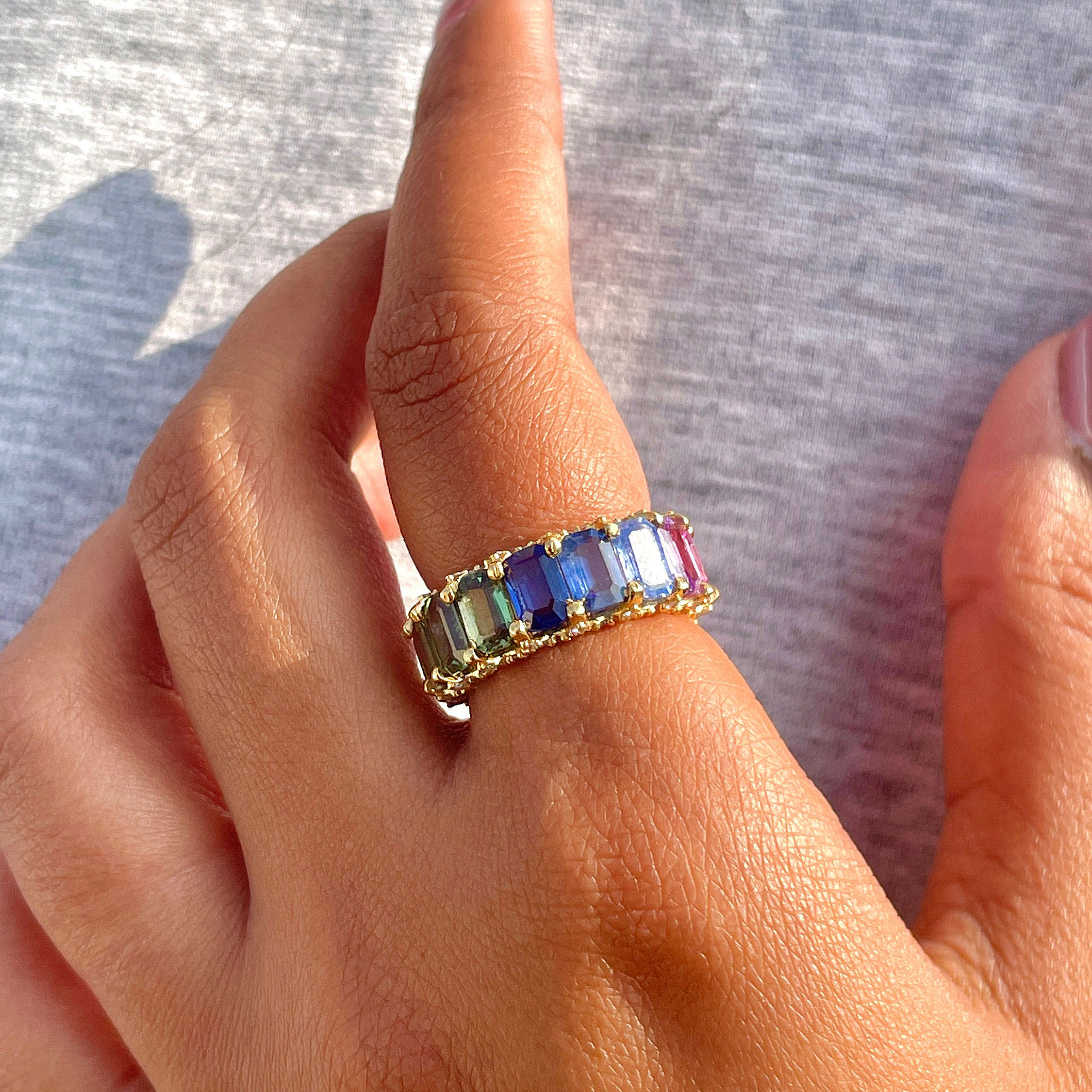 6.75ct Emerald Cut Rainbow Sapphire Eternity Ring