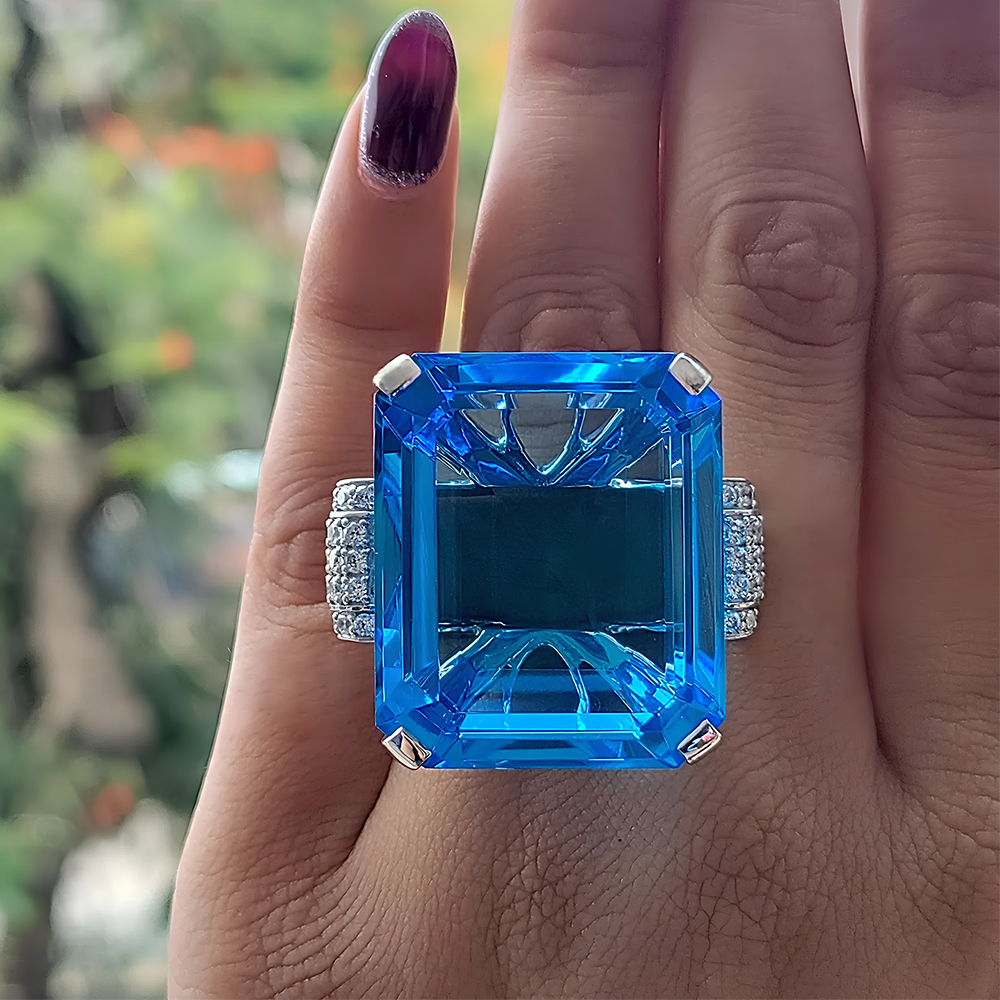 15ct Emerald Cut Blue Sapphire Side Diamond Engagement Ring