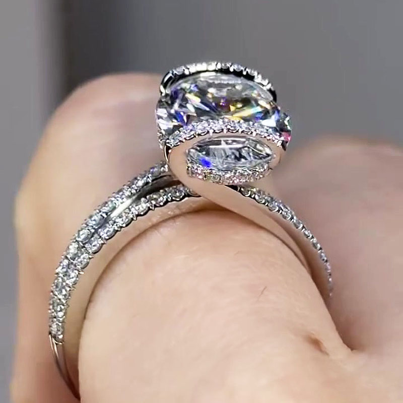 Unique 6ct Oval Cut White Sapphire Halo Engagement Ring