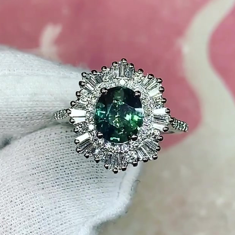 1.5ct Oval Cut Emerald Sapphire Stellar Halo Engagement Ring