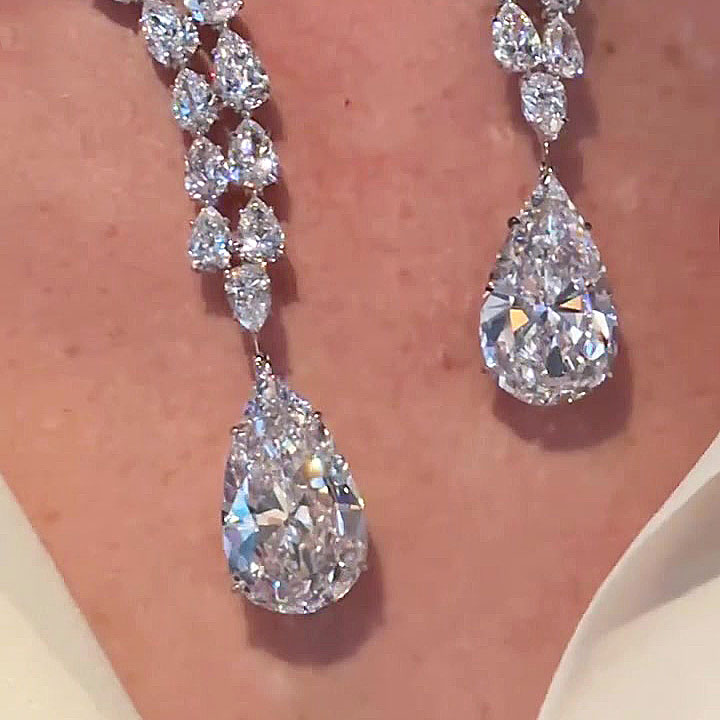 Open Design Pear Cut White Sapphire Pendant Necklace