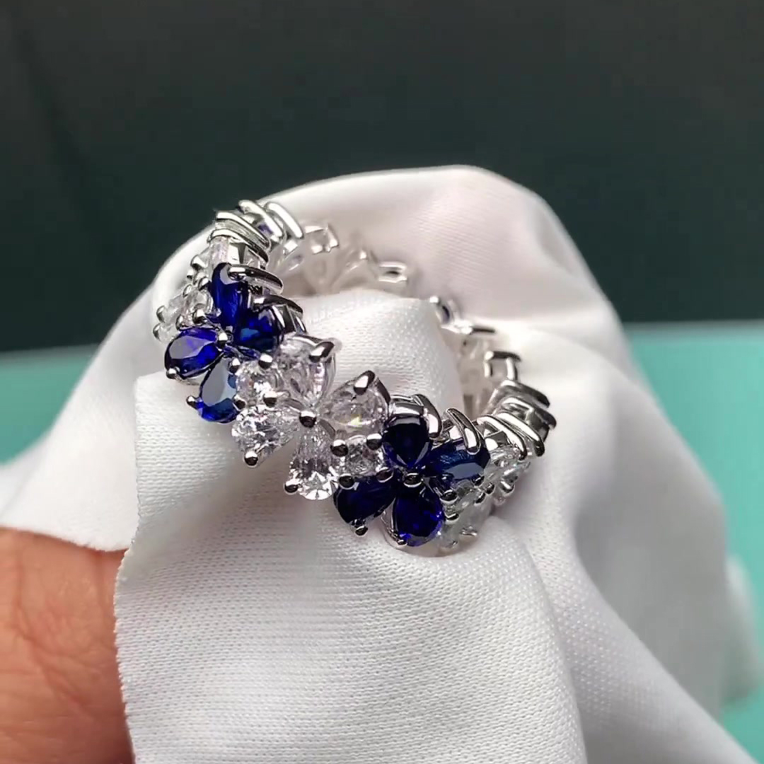 6.55ct Flower Design Pear Cut Blue Sapphire Eternity Ring