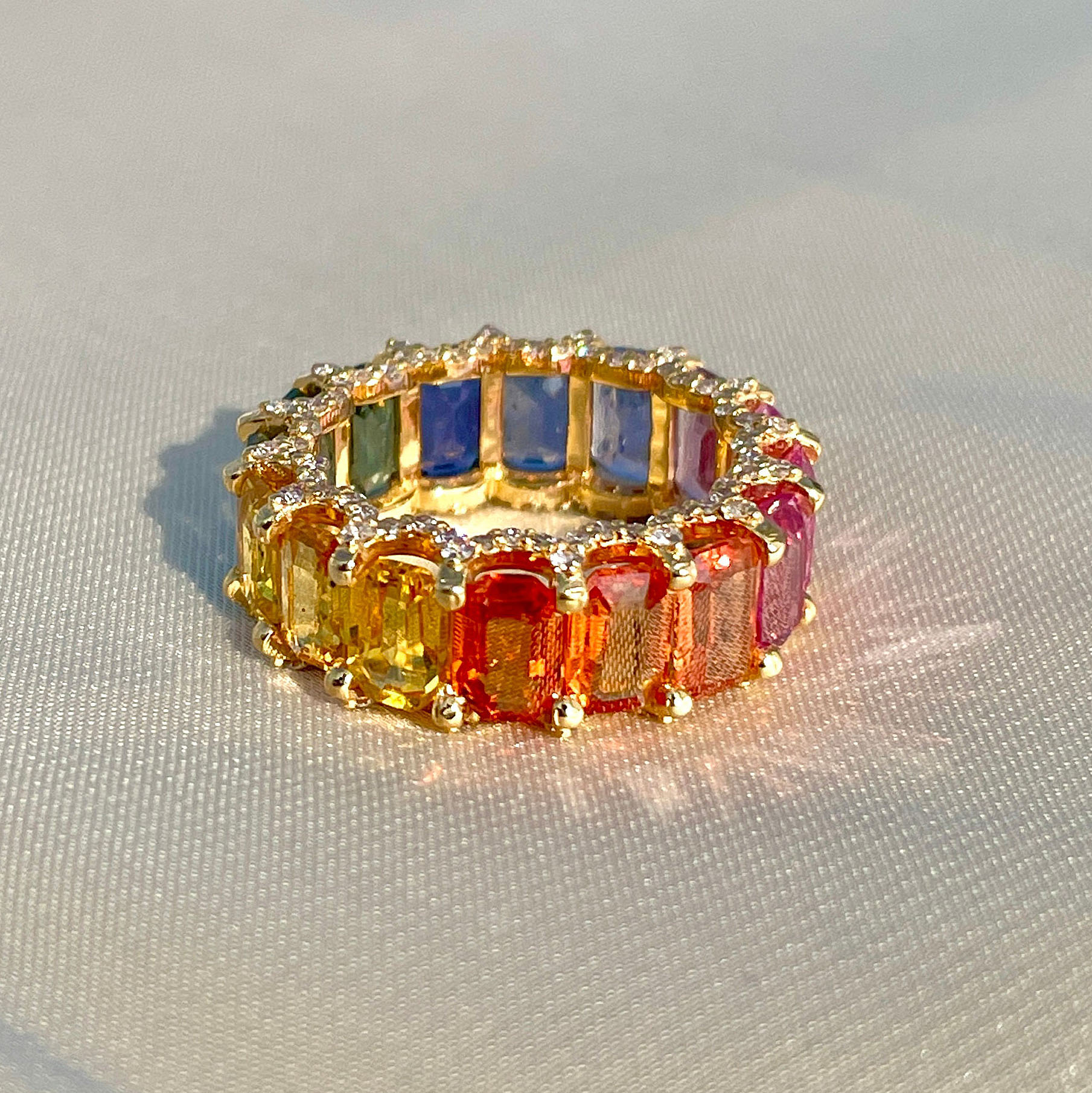 6.75ct Emerald Cut Rainbow Sapphire Eternity Ring