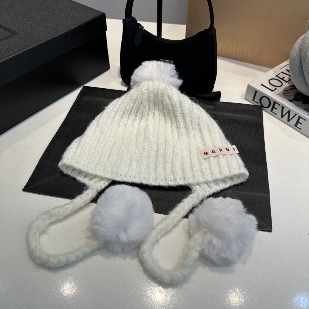 M hand-knitted patchwork rabbit fur ball bucket hat