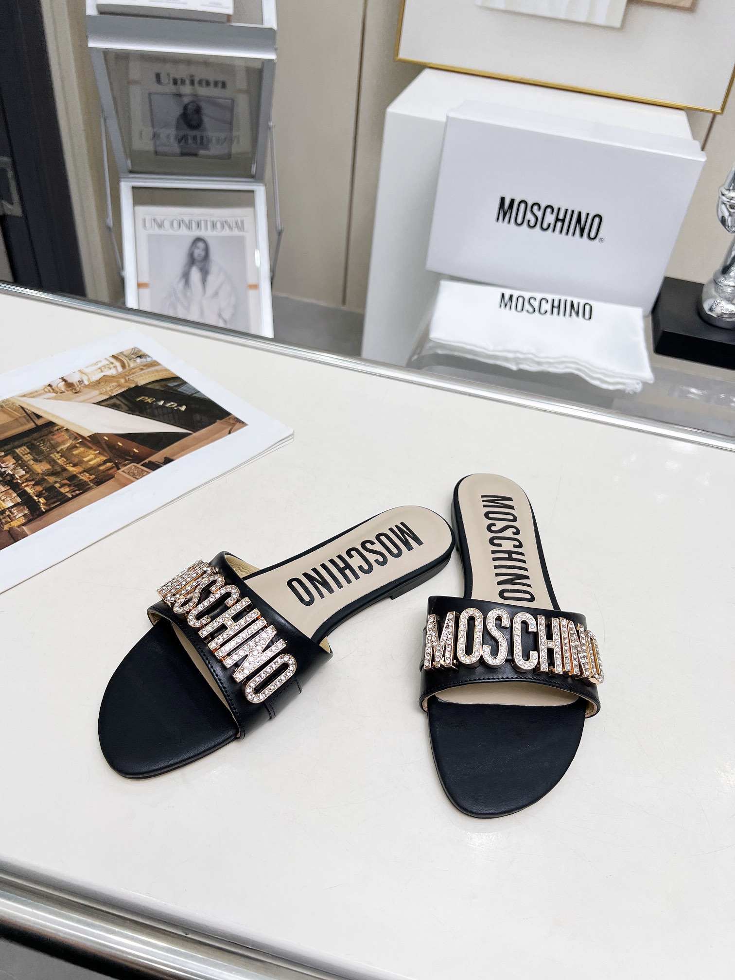Moschino mother of metal diamond buckle slippers