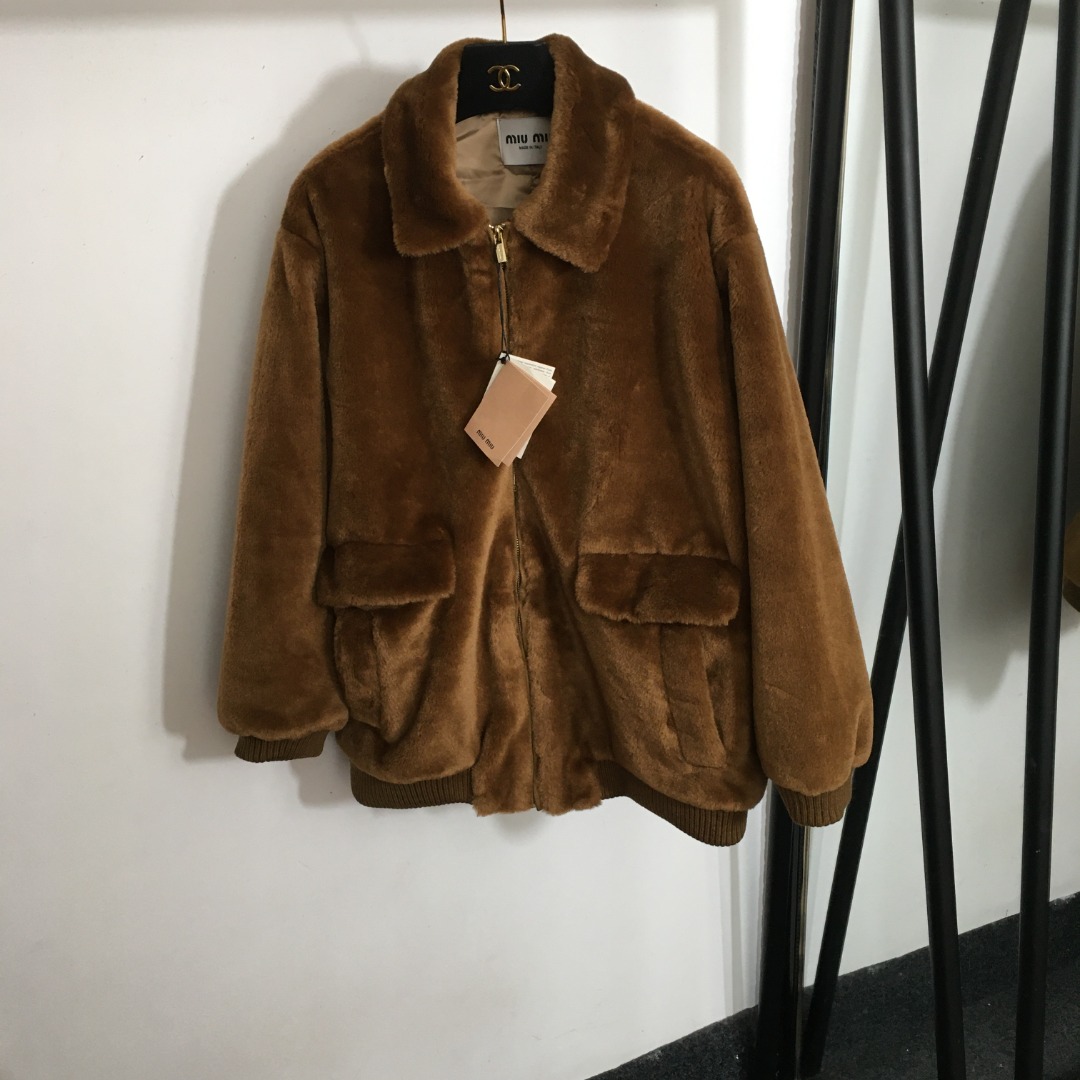 Miu new fur coat with leather logo on the back