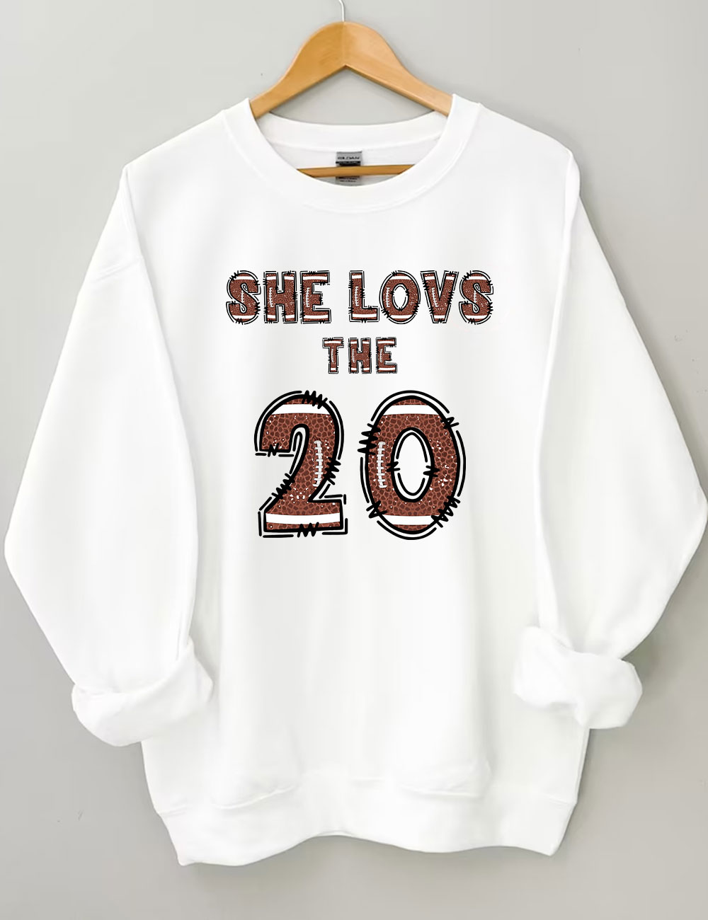 She Loves The Football Custom Number Sweatshirt