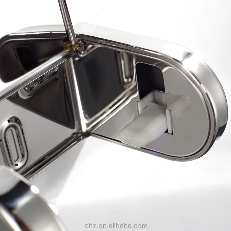 Stainless steel toilet paper holder in bathroom setting