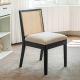 Single black chair from a cane back dining chairs set of 2 in a bright room.
