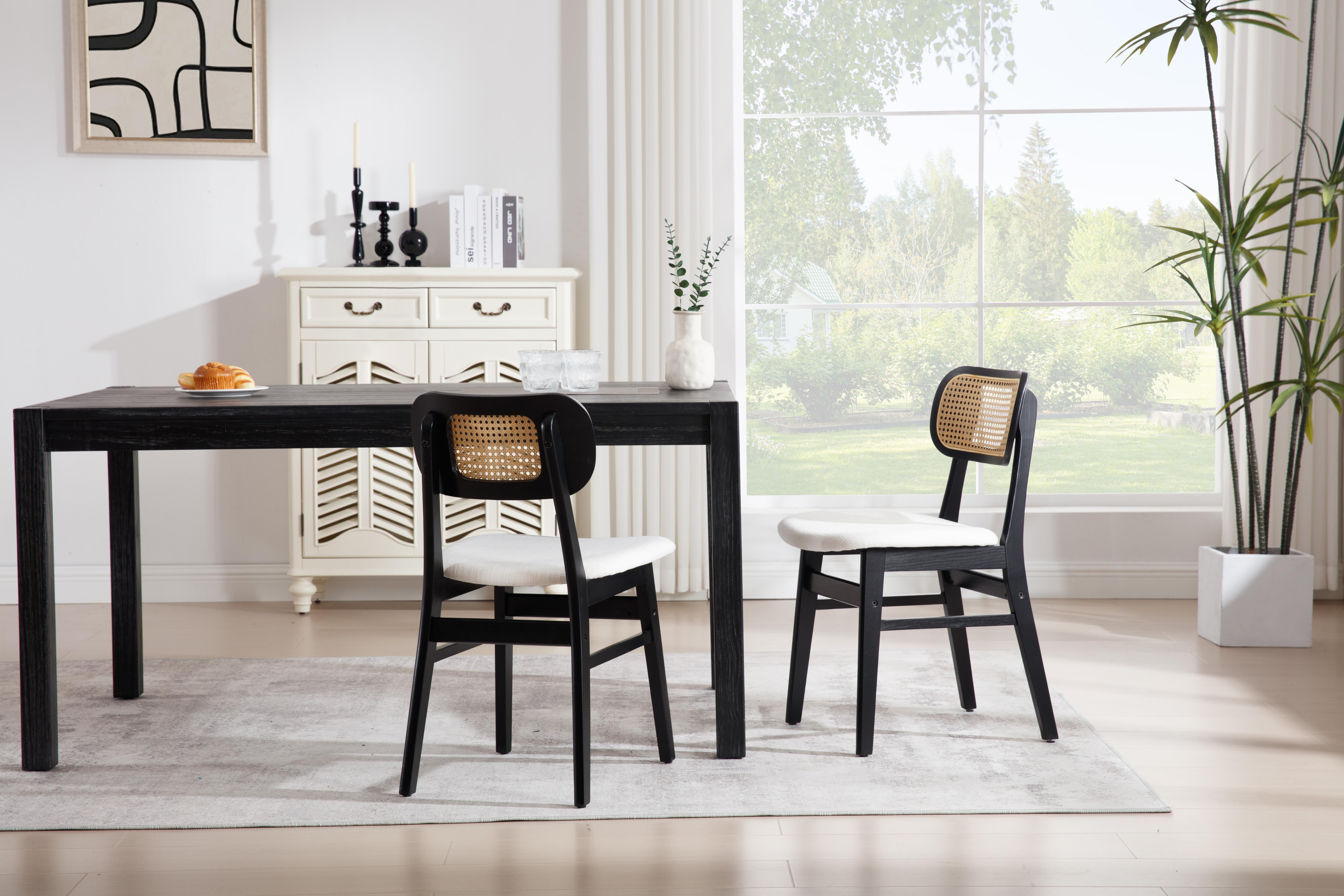 Solid wood cane dining chair with a padded linen seat and armless frame