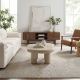 Affordable coffee table styled in a bright living room with neutral décor, wood furniture, and modern minimalist design