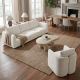 Affordable coffee table centered in a cozy living room with white sofa, armchairs, natural rug, and warm wood flooring