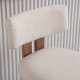 close up of beige upholstered backrest and seat on counter stools set of 2 with solid wood frame