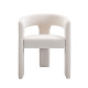 Ivory white dove luxury dining chair with a curved back and unique three-legged design.
