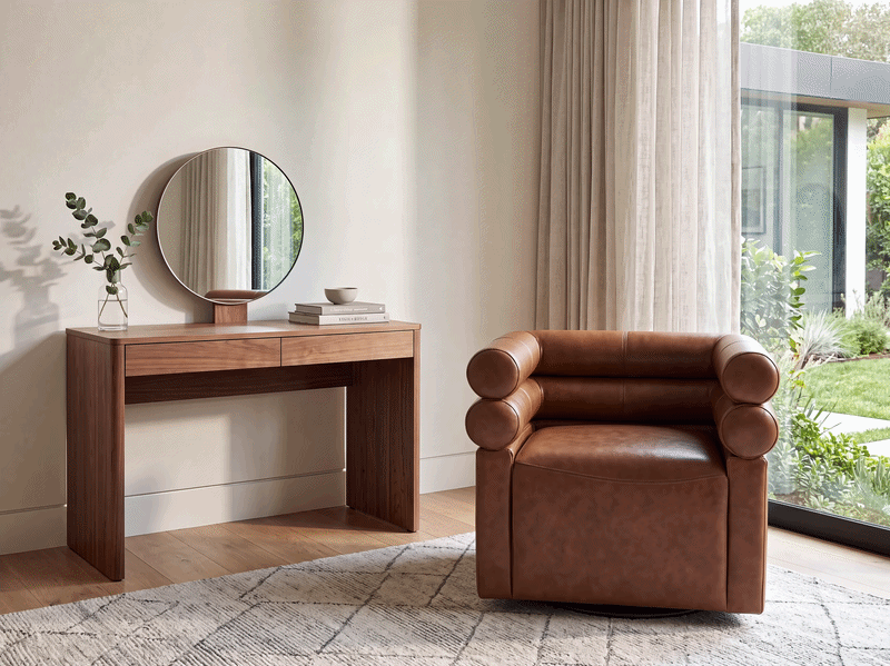 Premium vegan leather upholstery on a walnut lounge chair