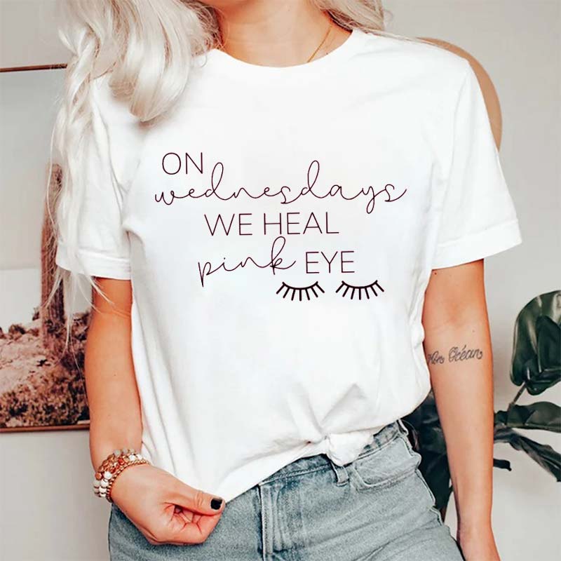 On Wednesdays We Heal Pink Eye Nurse T-Shirt