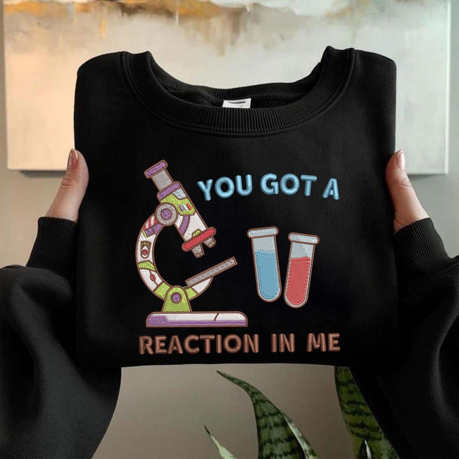 Embroidered You Got A Reaction In Me Sweatshirt