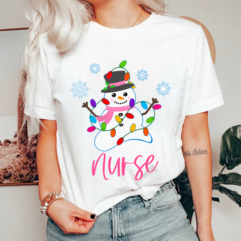Snowman Playing With Lanterns Nurse T-Shirt
