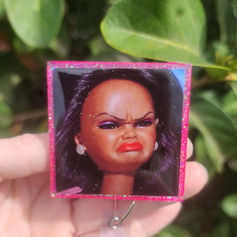 Cringe Doll Badge Reel