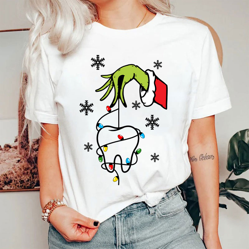 Santa Hand Holding A Tooth Take Care Of Your Teeth T-Shirt