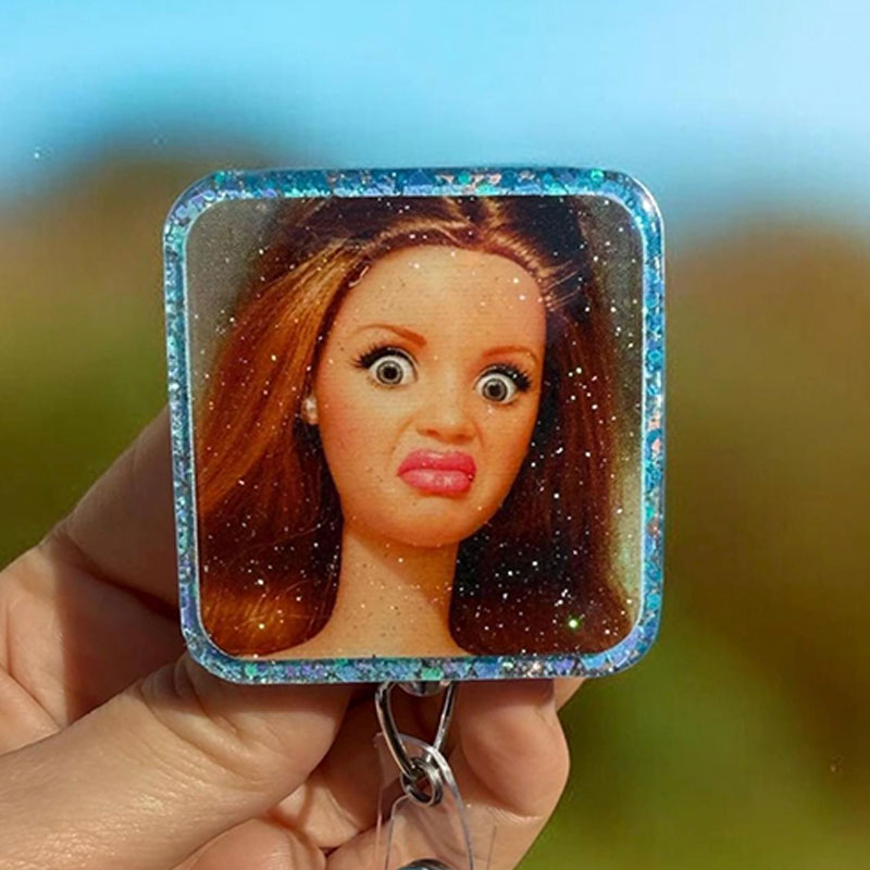 Funny Cringe Doll Badge Reel