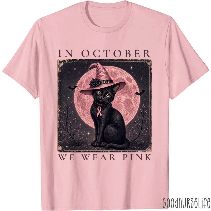 In October We Wear Pink Witch Black Cat Pink Moon Breast Cancer Awareness Teacher T‑Shirt