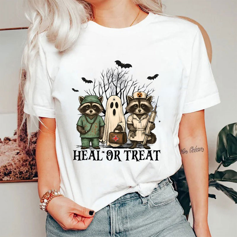 Halloween Raccoon And Ghost Nurse Heal Or Treat T-Shirt
