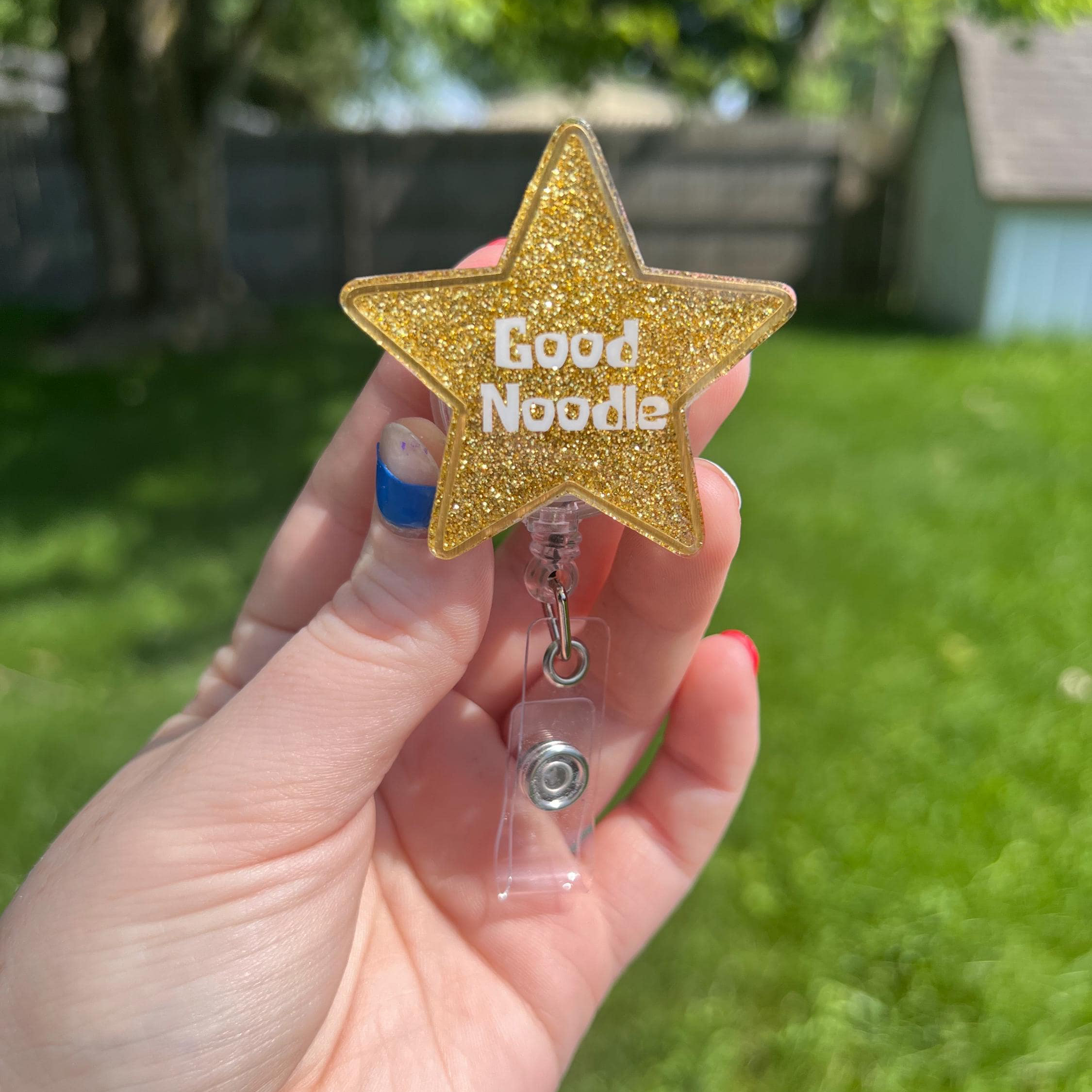 Good Noodle Badge Reel