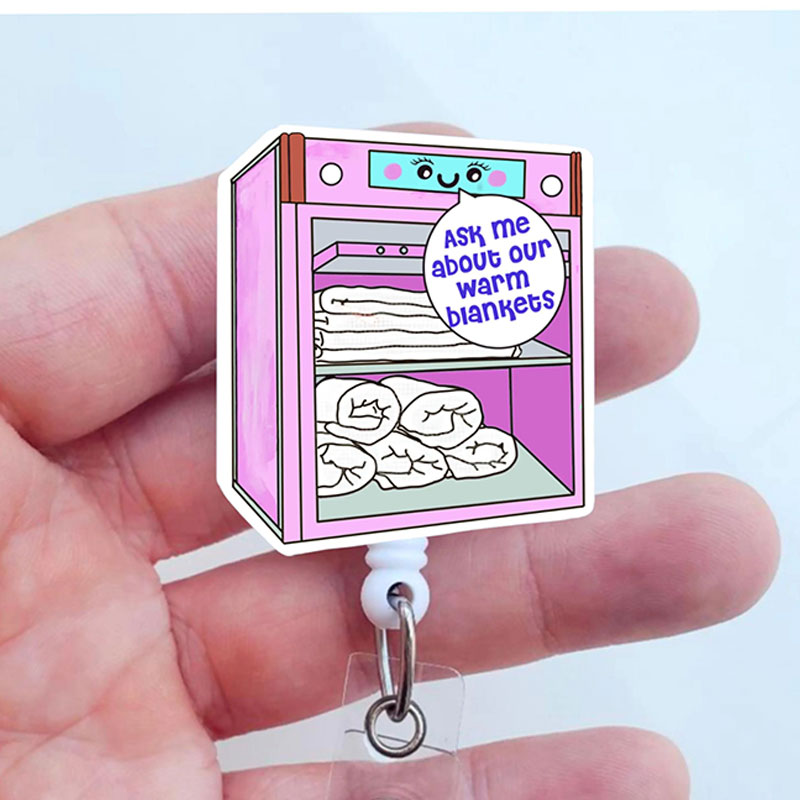 Ask Me About Our Warm Blankets Badge Reel
