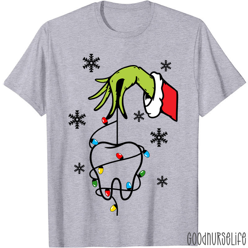 Santa Hand Holding A Tooth Take Care Of Your Teeth T-Shirt