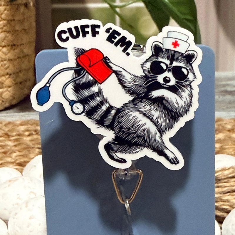 Cuff ’Em Raccoon Nurse Badge Reel