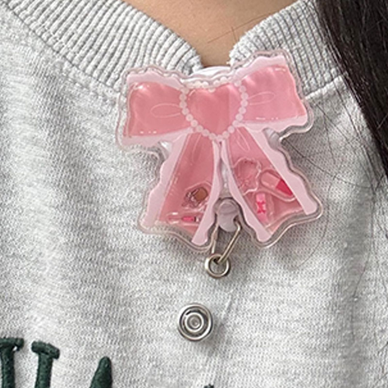 Pink Bow Shaker Badge Reel