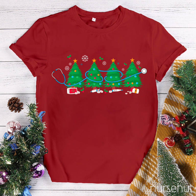 Snowflakes On The Christmas Tree Falling Silently Nurse T-Shirt