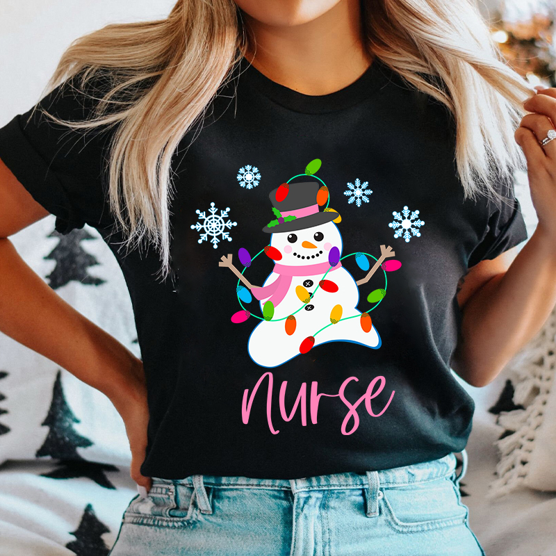 Snowman Playing With Lanterns Nurse T-Shirt