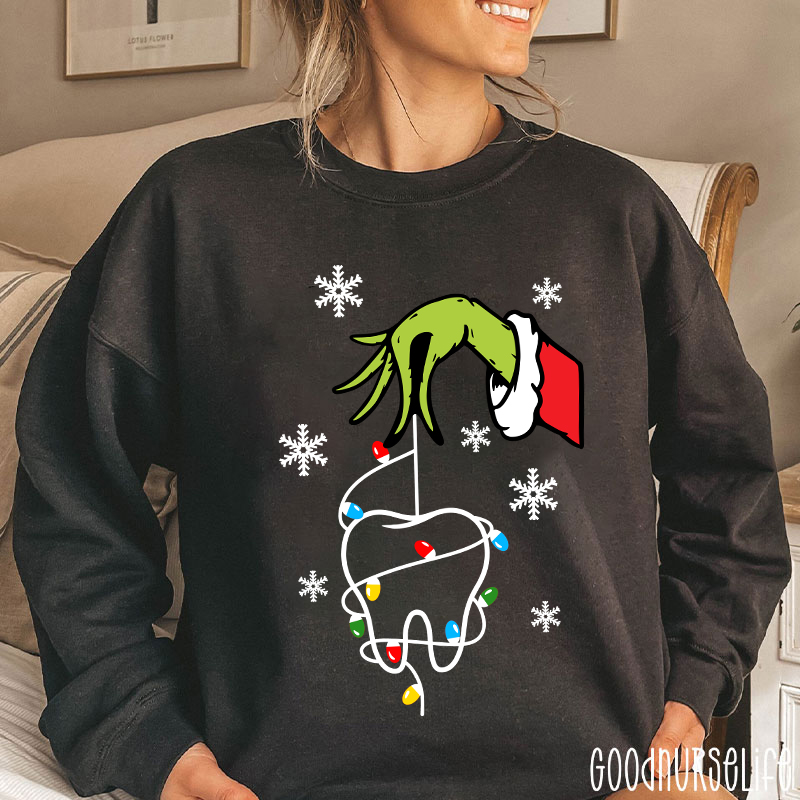 Santa Hand Holding A Tooth Take Care Of Your Teeth Sweatshirt