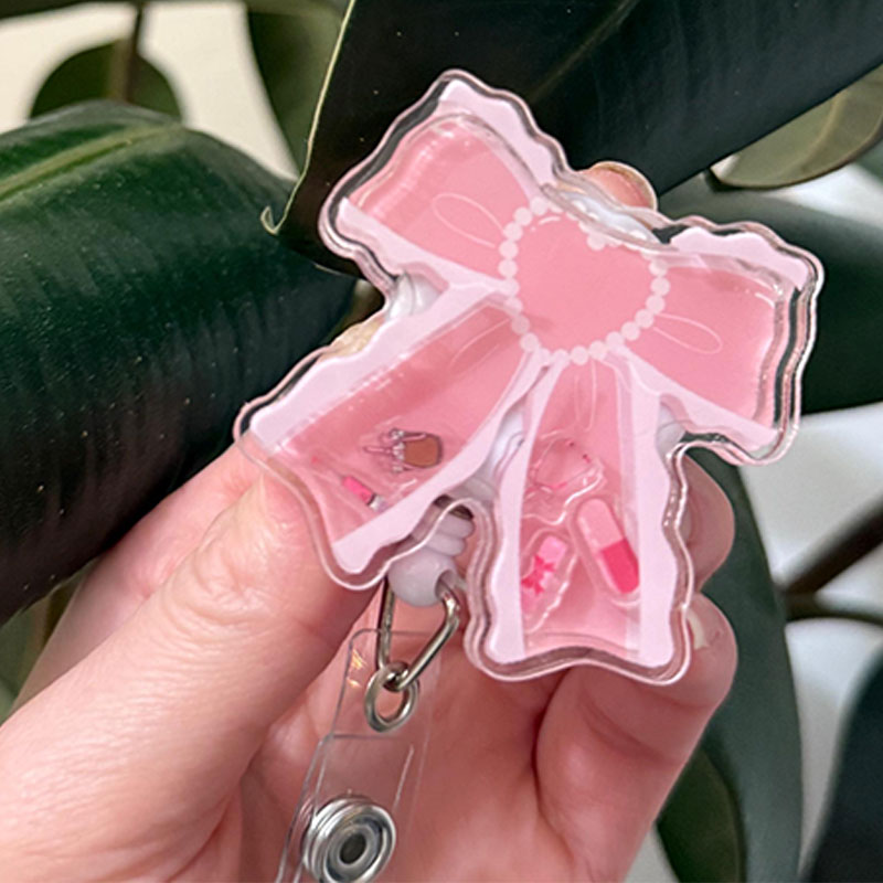 Pink Bow Shaker Badge Reel