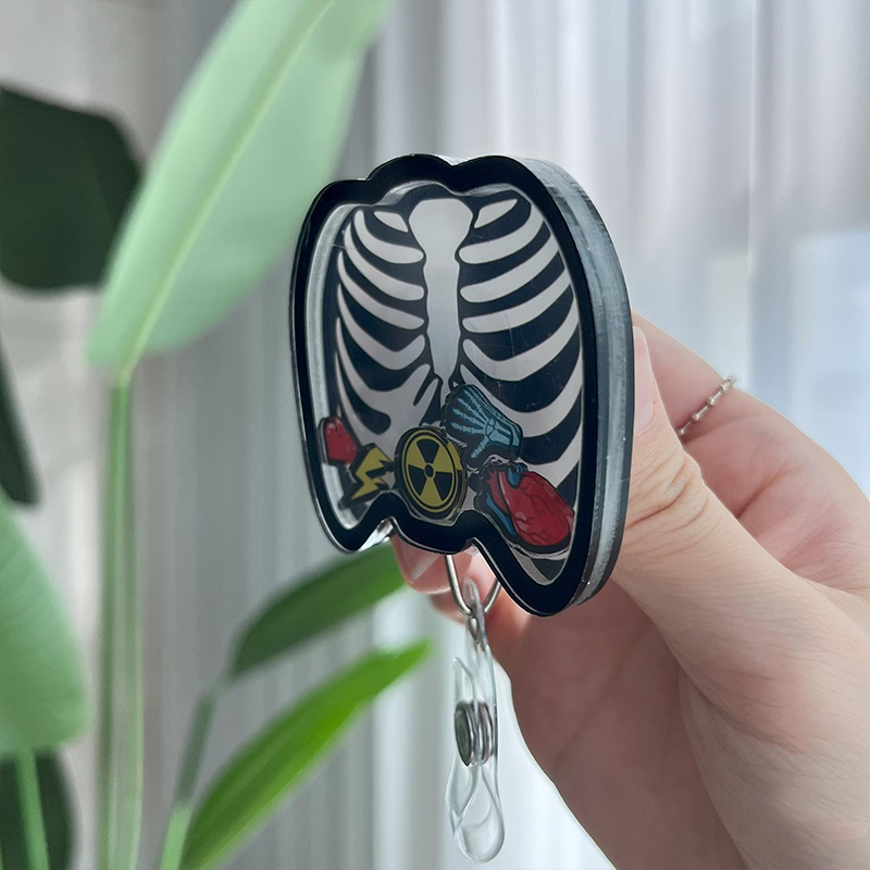 Rib Cage Shaker Badge Reel